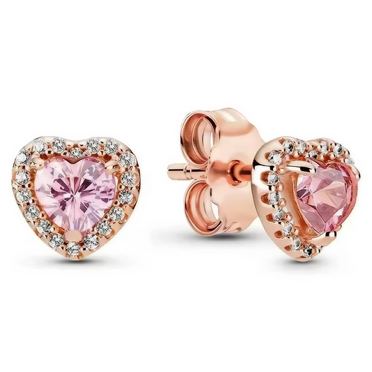 Ces boucles d'oreilles raffinées sont décorées de petites pierres en forme de cœurs roses, offrant une touche délicate et romantique à votre style. Leur design simple mais chic se marie parfaitement avec toutes les tenues, ajoutant une touche dynamique et pleine de charme. Idéales pour sublimer votre look au quotidien ou lors d’occasions spéciales.