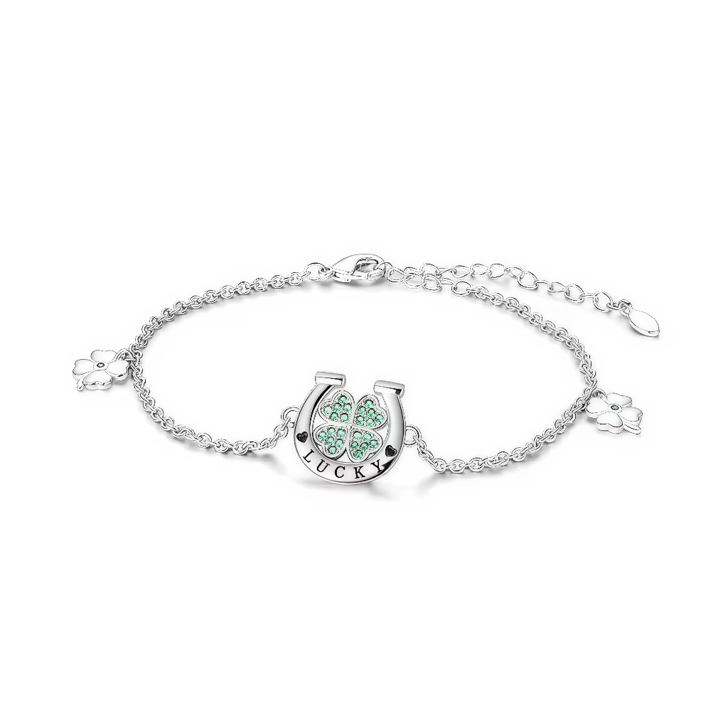 Ce bracelet fin en argent 925 met en avant un pendentif fer à cheval gravé « LUCKY », renfermant un trèfle à quatre feuilles serti de cristaux verts pour attirer chance et bonnes ondes.
De petits trèfles latéraux et une chaîne réglable en font un bijou idéal à offrir comme talisman porte‑bonheur du quotidien.
