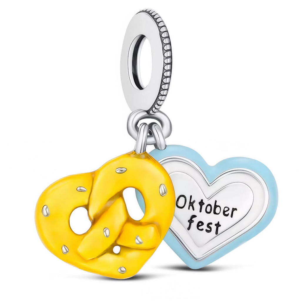 Ce charm célèbre la convivialité de l’Oktoberfest avec deux pendentifs colorés : un grand bretzel doré, emblème gourmand de la fête bavaroise, et un cœur bleu pastel gravé "Oktoberfest". Les finitions brillantes et les détails naïfs en font un bijou fun à offrir ou à porter, parfait pour les passionnés de traditions allemandes, de gastronomie et de moments festifs.

Caractéristiques
Matière : Argent 925, émail jaune doré et bleu pastel
Design : Bretzel tridimensionnel, cœur gravé, bélière argentée classique