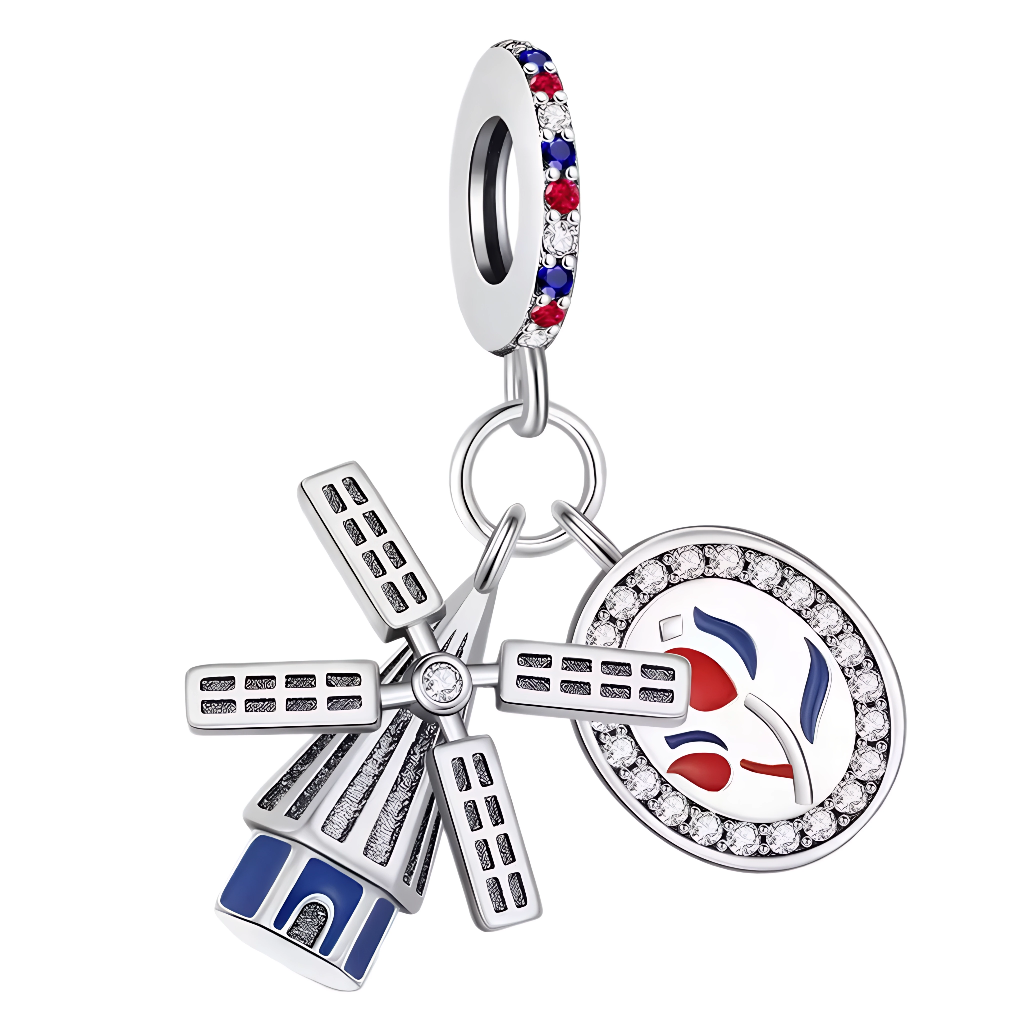 Ce charm célèbre l’âme des Pays-Bas avec un moulin à vent argenté rehaussé de touches d’émail bleu, accompagné d’un médaillon serti façon drapeau néerlandais. La bélière pavée de cristaux blanc, rouge et bleu apporte élégance et éclat à l’ensemble, rappelant les couleurs nationales. Parfait pour les voyageuses, amatrices de culture hollandaise ou amateurs de paysages bucoliques, il apporte poésie et caractère à tous les bracelets à charms européens.

Caractéristiques
Matière : Argent 925, émail coloré, cris