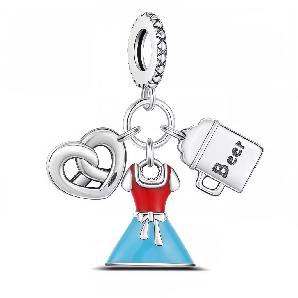 Ce charm met à l’honneur la traditionnelle fête bavaroise avec trois pendentifs : une robe Dirndl éclatante en rouge et bleu, un bretzel ajouré en argent, et une chope gravée "Beer". Les détails évoquent l’ambiance festive et gourmande de l’Oktoberfest, faisant de ce bijou un incontournable pour tous les amoureux de l’Allemagne, de la convivialité et des soirées à thème. À porter sur un bracelet pour une touche joyeuse et authentique.

Caractéristiques
Matière : Argent 925, émail coloré, gravure "Beer"
Desi