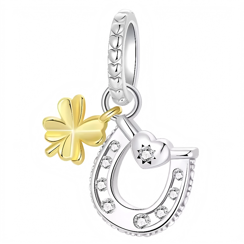 Apportez une touche de chance et de raffinement à votre collection avec ce charm Fer à Cheval argent et doré. Symbole de chance et de protection, ce bijou élégant est orné d'une finition dorée, ajoutant une touche de sophistication et de brillance à votre bracelet. Parfait pour ceux qui croient en la chance et pour ceux qui cherchent un symbole de bonne fortune dans leur vie quotidienne.