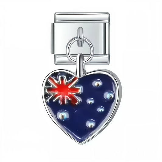 Ce charm italien pendentif en forme de cœur arbore fièrement le drapeau de la Nouvelle-Zélande, symbole de nature sauvage et d’identité unique. Fabriqué en acier inoxydable de haute qualité, il allie robustesse et finesse des détails pour un rendu élégant et coloré. Facile à fixer, il s’adapte parfaitement à nos bracelets composés de 17 maillons extensibles et réglables, convenant à toutes les tailles de poignet. Compatible avec tous nos charms italiens