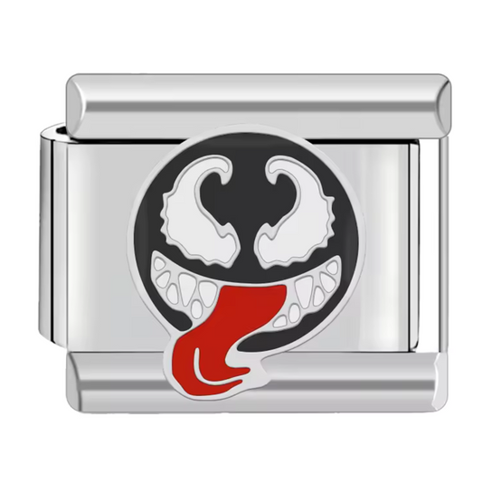 Ce charm italien saisissant représente le visage emblématique de Venom, tirant la langue dans une expression pleine de caractère et d’audace. Confectionné en acier inoxydable argenté de haute qualité, il offre des détails précis et un fini brillant pour un bijou durable et original. Facile à fixer, il se glisse parfaitement sur nos bracelets composés de 17 maillons extensibles et réglables, adaptés à tous les poignets. Compatible avec tous nos charms italiens, ce bijou est parfait pour ajouter une touche re