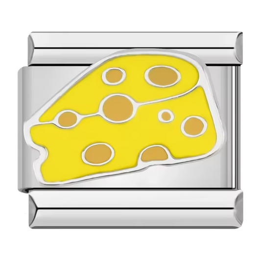 Ce charm italien gourmand représente un morceau de fromage délicatement détaillé, symbole de tradition et de convivialité. Confectionné en acier inoxydable argenté de haute qualité, il séduit par ses finitions soignées et son éclat durable. Facile à fixer, il s’adapte parfaitement à nos bracelets composés de 17 maillons extensibles et réglables, adaptés à tous les poignets. Compatible avec tous nos charms italiens, ce bijou savoureux apporte une touche authentique et chaleureuse à votre collection.