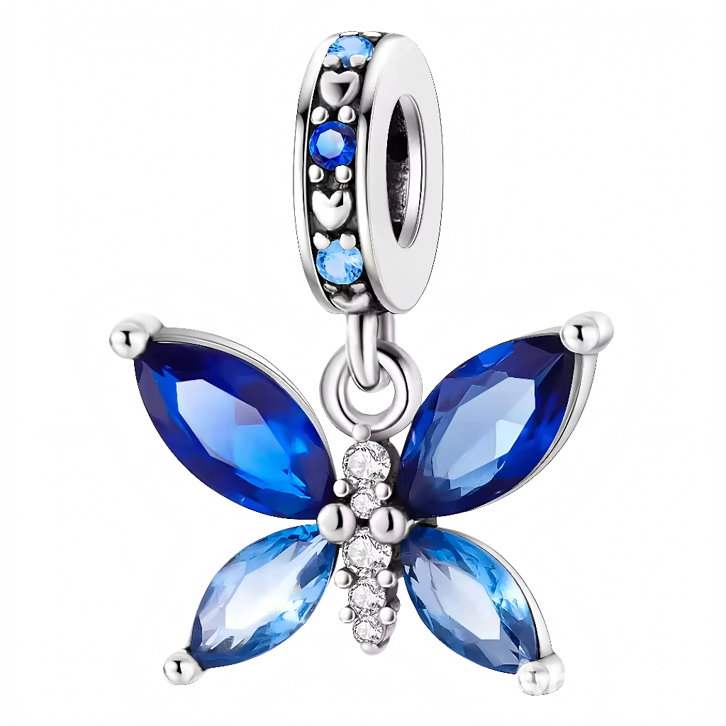 Laissez-vous envoûter par la beauté aérienne de ce charm en argent 925 représentant un papillon bleu. Symbole de transformation, de liberté et de légèreté, ce bijou évoque les instants précieux et les envolées du cœur.