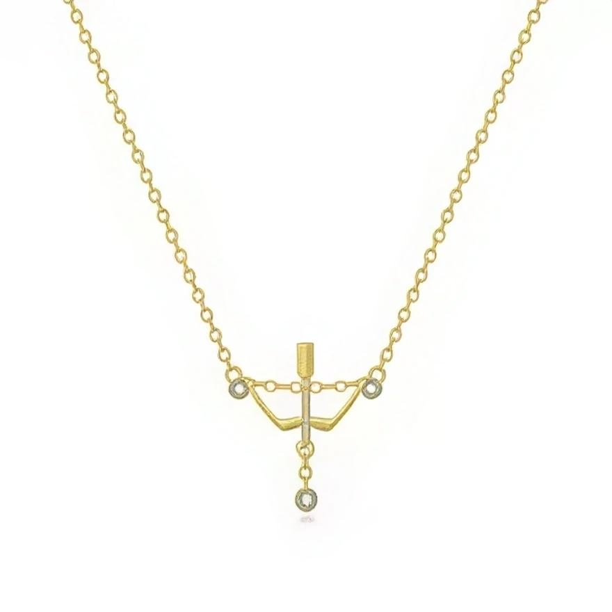 Ce collier doré met en avant un pendentif très graphique rappelant une petite balance ou un mobile, composé de fines barres géométriques et de trois petits cabochons ronds sertis de cristaux clairs. Le motif central, suspendu à une chaîne à maillons réguliers assortie, crée une ligne épurée et moderne qui se pose délicatement au creux du cou.

Caractéristiques :

-Matière : Métal ton or avec cristaux transparents.
-Design : Structure géométrique façon balance, avec trois pastilles rondes scintillantes dont 